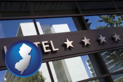 new-jersey map icon and a hotel facade