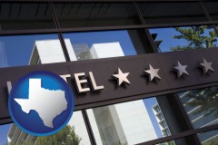 texas map icon and a hotel facade