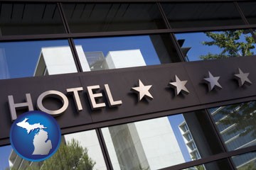 a hotel facade - with Michigan icon
