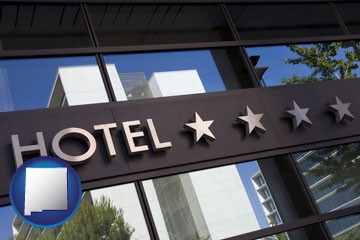 a hotel facade - with New Mexico icon